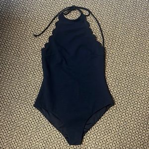 Marysia Scalloped Edge Halter Neck Swimsuit
One Piece - Small